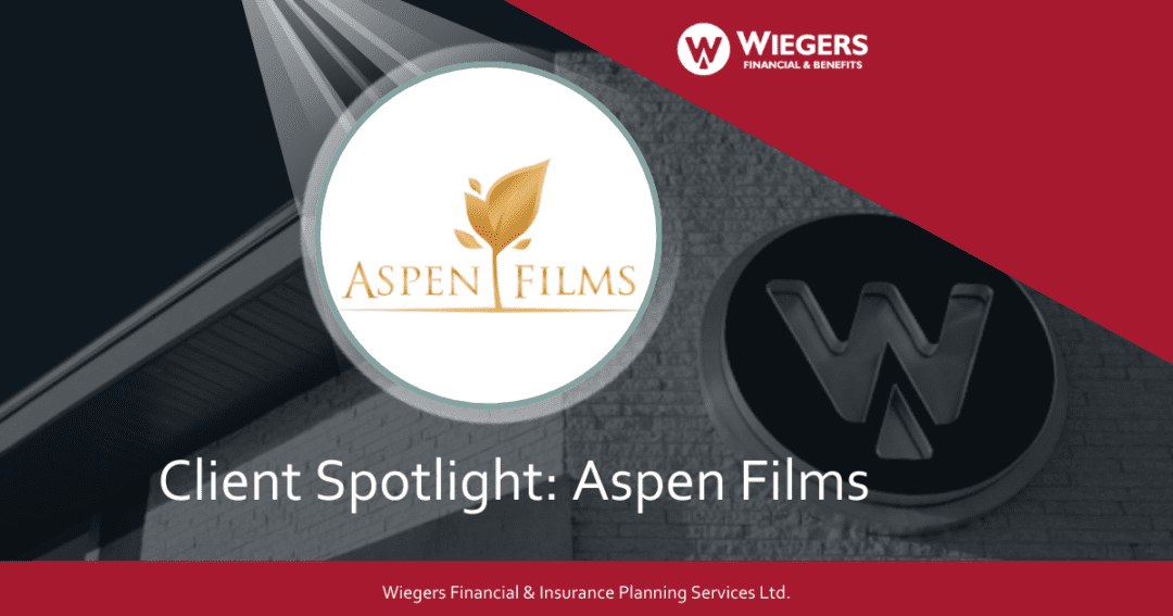 Wiegers financial and benefits building with Aspen Films logo in front with a light shining on it